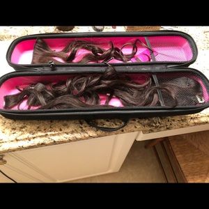 Long clip in hair extensions.